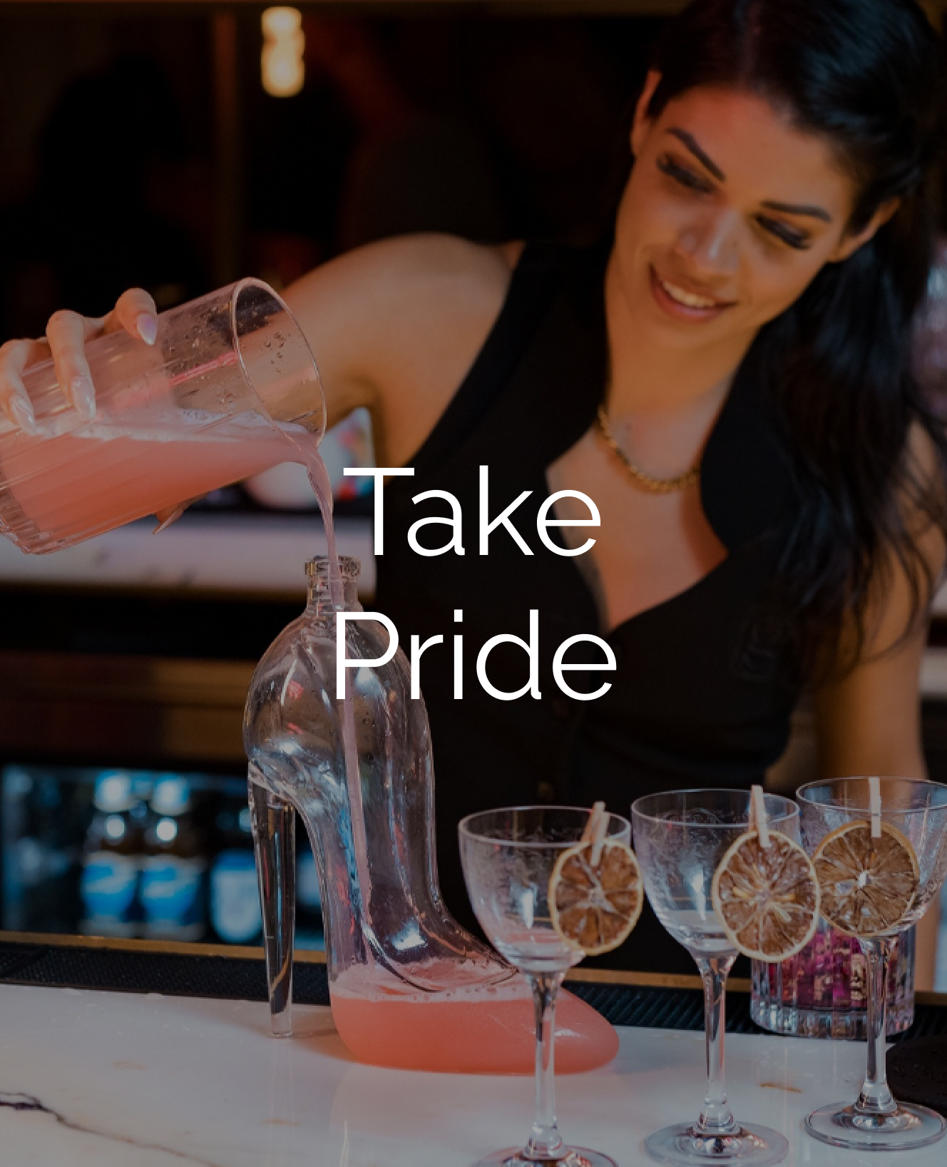 take pride text over image of bartender making cocktail